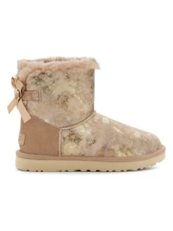 Ugg Leder-Boots "Mini Bailey Bow Gold Wash" In Beige/ Gold